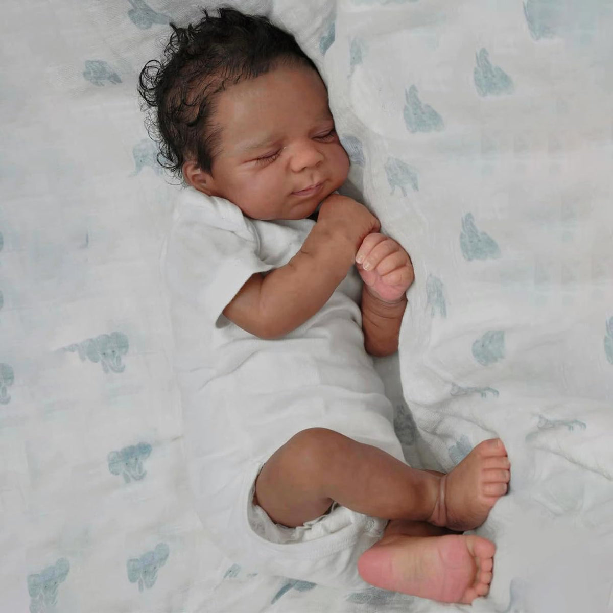 Zero Pam Black Reborn Doll 18in face close-up shows lifelike skin for realistic play.