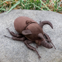ZHONGXIN MADE Atlas Beetle plush close-up face, vivid eyes invite imagination.