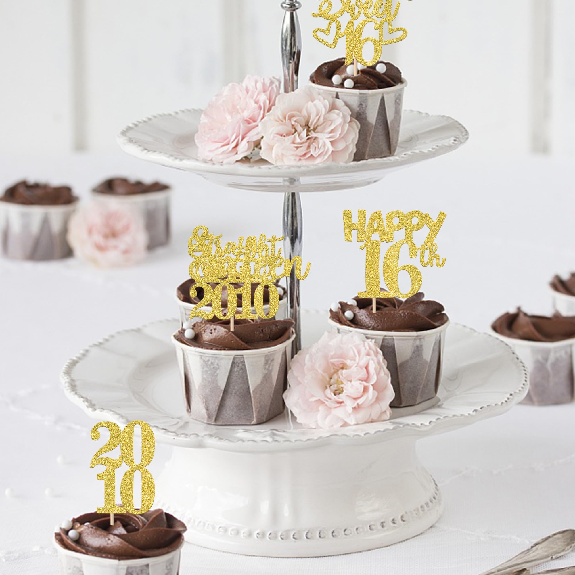 ZHUOWEISM gold glitter pick catches light on cupcakes and cookies.