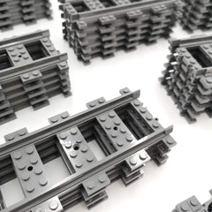 ZHX 56pcs flexible train tracks for curved routes and creative layouts.