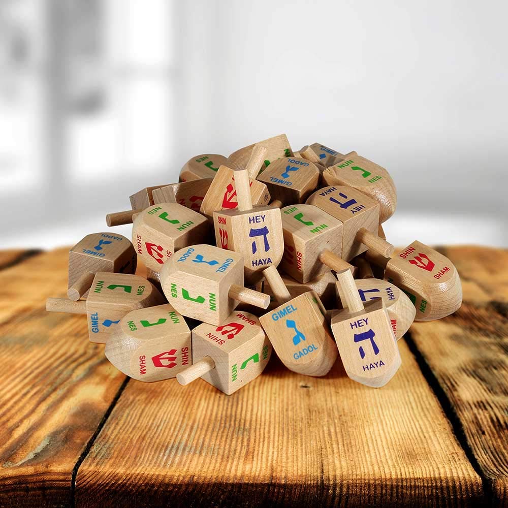 Zion Judaica dreidel shows nun gimel hey shin letters on all sides