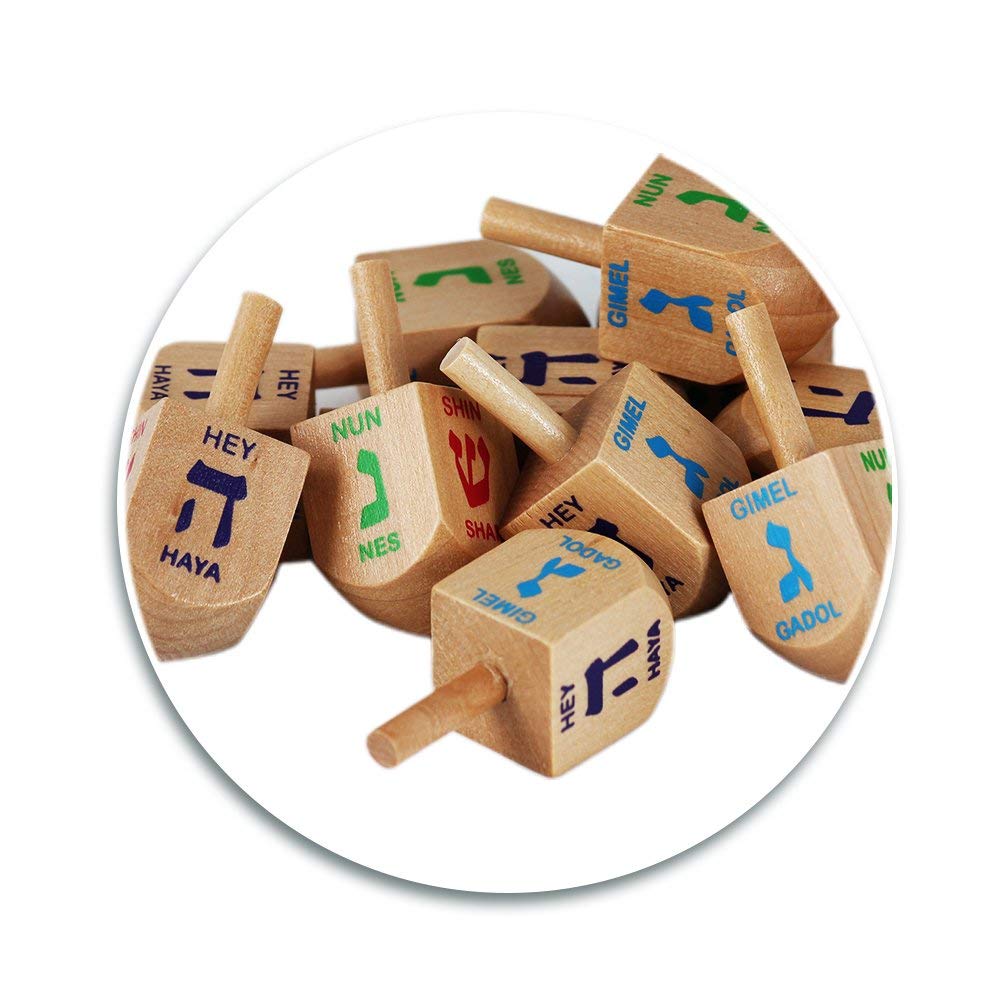 Hanukkah dreidel display featuring Zion Judaica wooden pieces