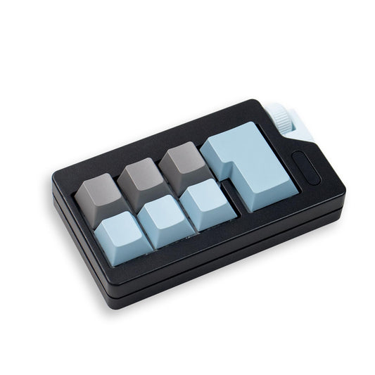 Zioyihan Keyboard Fidget Clicker black-blue front view for portable stress relief.