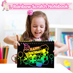 Kids scratch rainbow art in a classroom setting with ZMLM supplies.