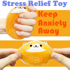 ZTATU orange Shiba Inu stress ball being squeezed, emphasizing soft material.