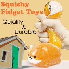ZTATU orange Shiba Inu stress ball showing portable desk-friendly design.