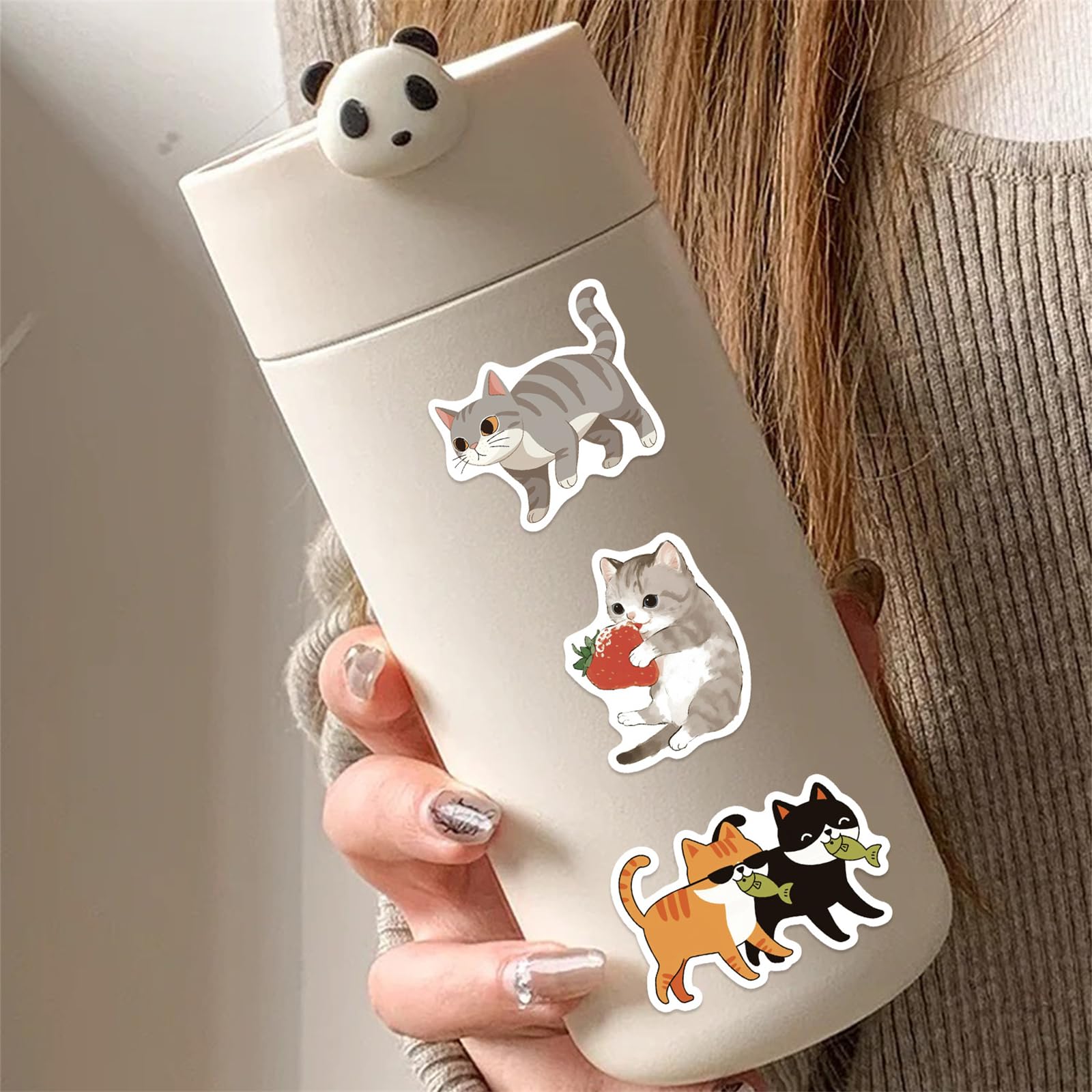 ZUIYIJIANGNAN cute cat sticker 03 on a water bottle resists wear over time.