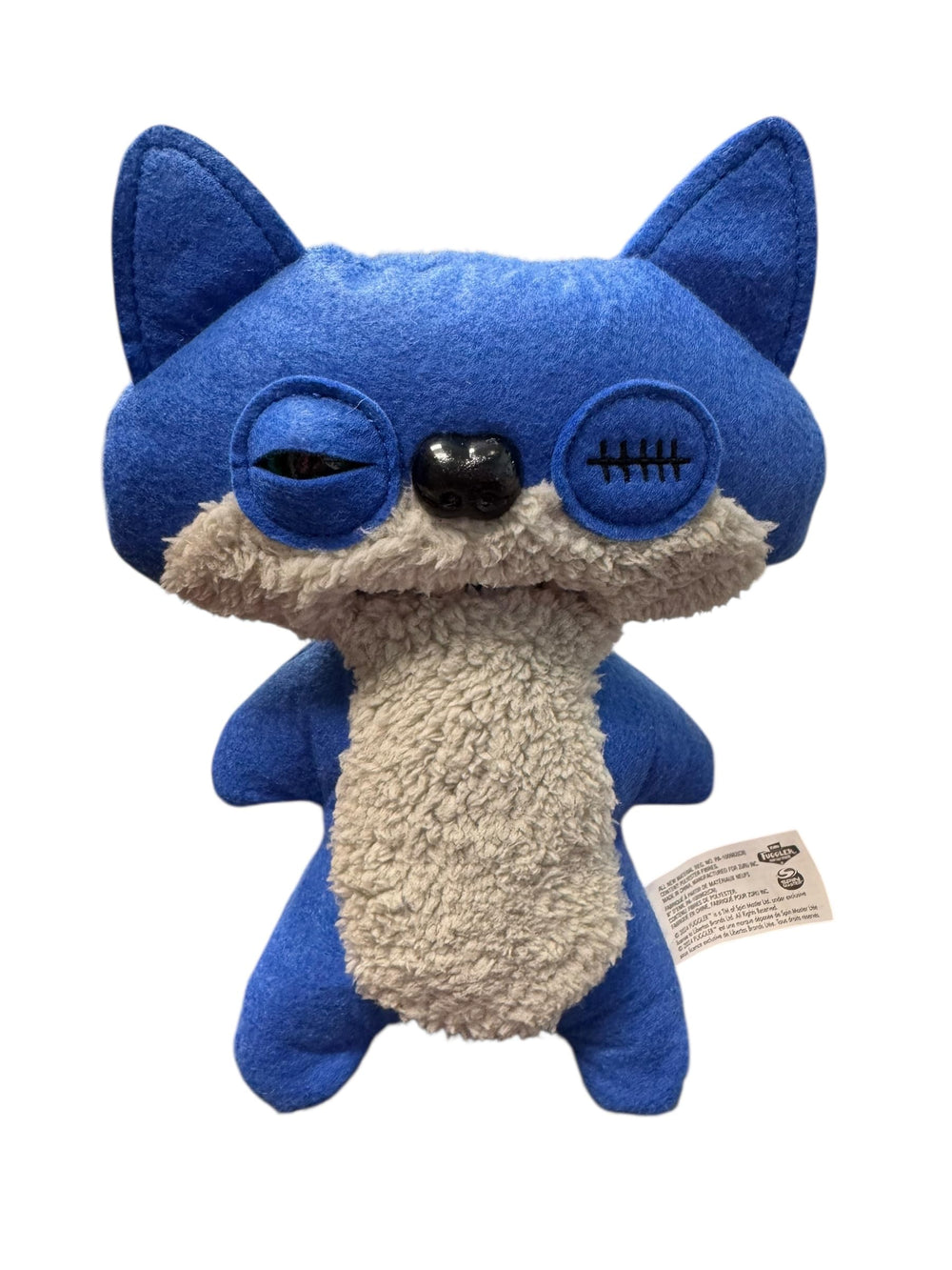 ZURU Fuggler Indecisive Monster plush, green figure with quirky charm.