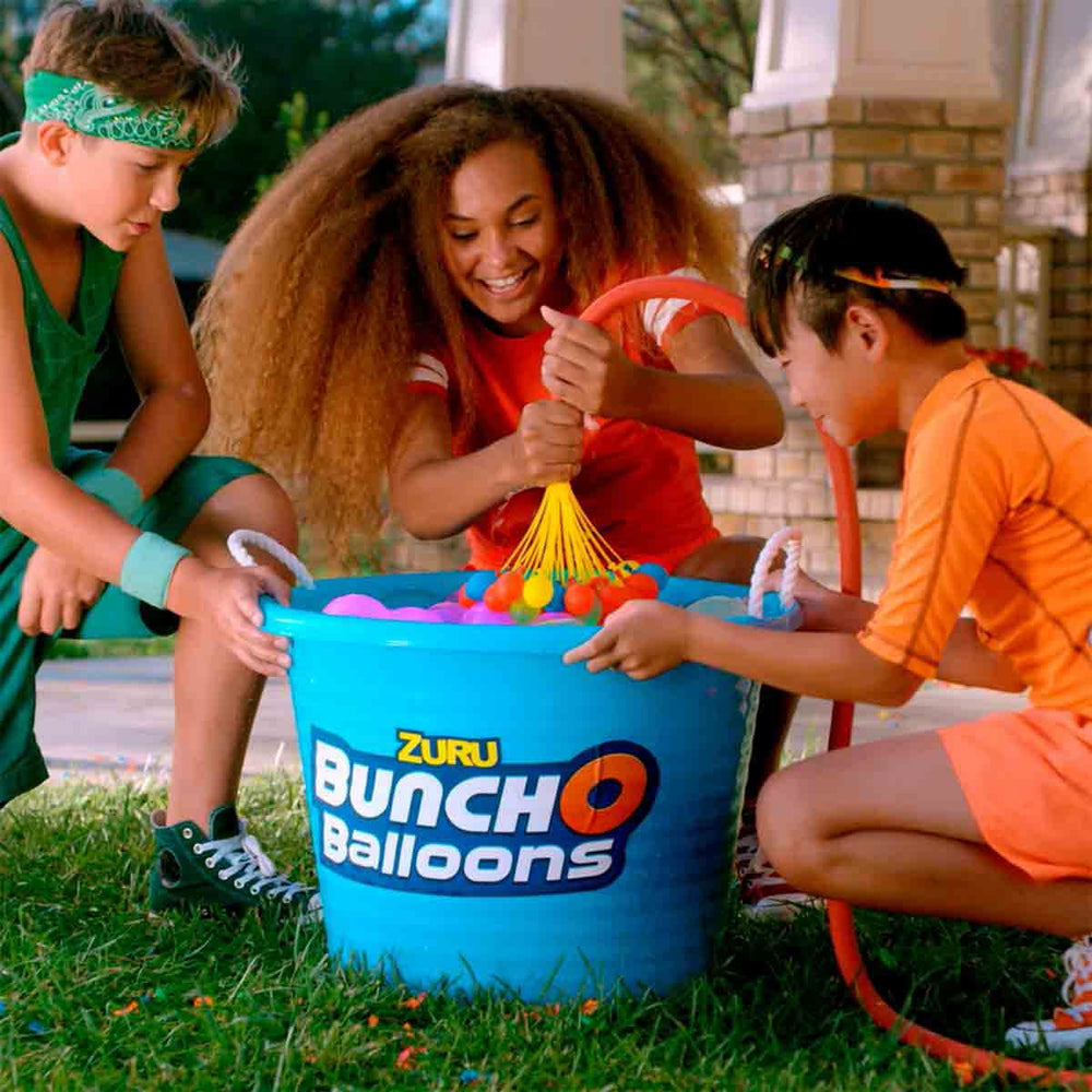 ZURU Self-Seal Water Balloons connected to a tap for quick filling.
