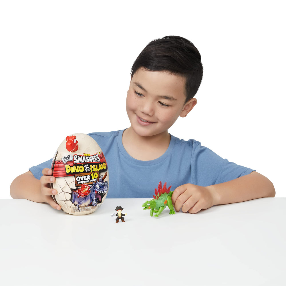ZURU Smashers Dino Island egg unboxing reveals a tiny dinosaur figure inside.