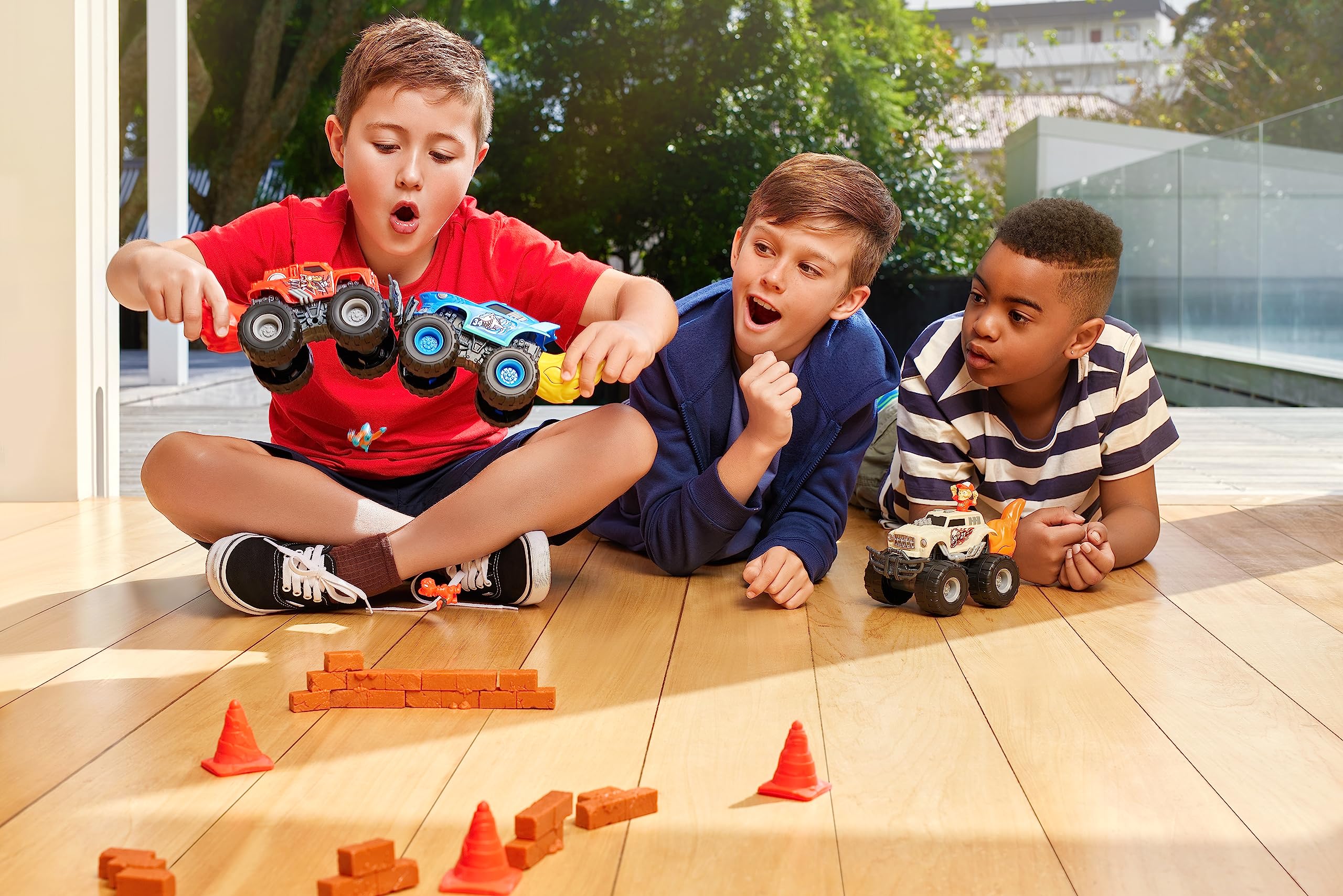 Three-truck set inspires imaginative play and quick race narratives.