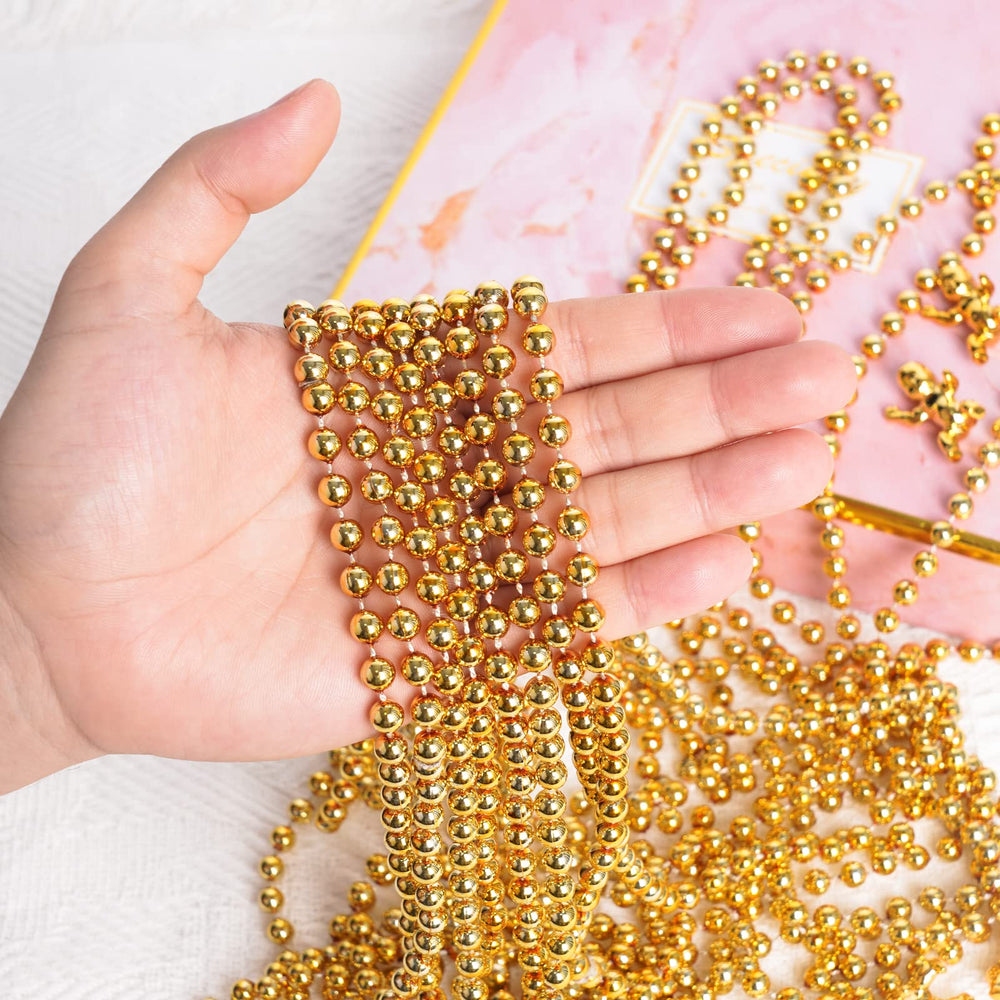 ZZYFGH Christmas party gold bead necklace shines under lights for festive celebrations.